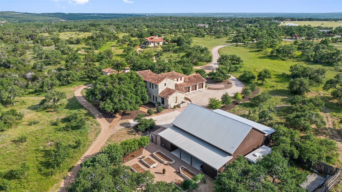 View 418 Cattle Trail DR in Dripping Springs Ranch 418 Cattle Trail DR - property photo 1 - Luxury home in Dripping Springs Ranch, Dripping Springs, TX