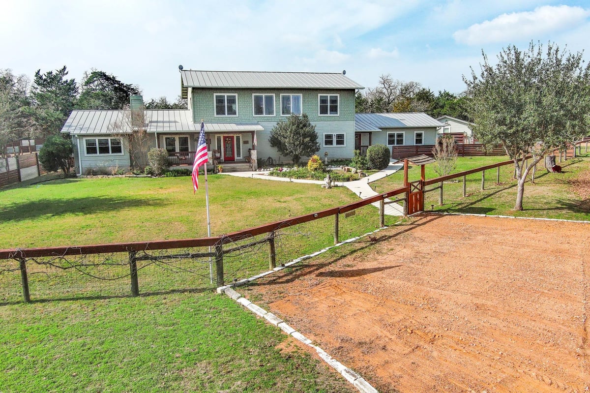 View 418 Vyvjala RD in Rocking M Ranch 418 Vyvjala RD - front exterior - Luxury home in Rocking M Ranch, Smithville, TX