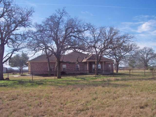 View 4189 FM 696 4189 FM 696 - front exterior - Luxury home in Lexington, TX