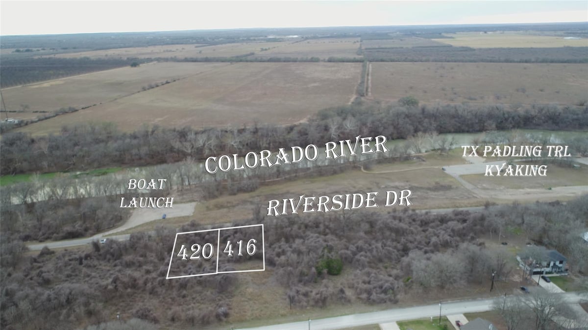 View 420 Riverside Dr in Tahitian Village, Unit 4 420 Riverside Dr - front exterior - Luxury lot in Tahitian Village, Unit 4, Bastrop, TX