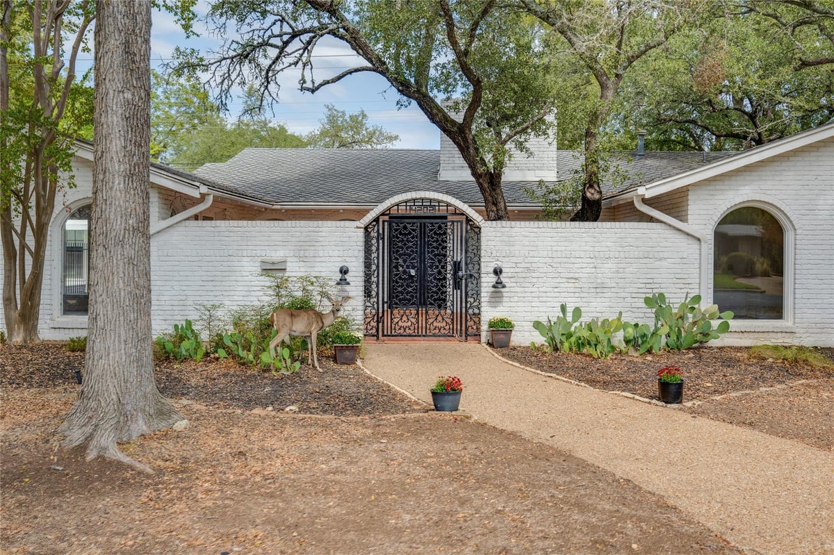 View 4202 N Hills DR in Northwest Hills Mesa Oaks Ph 4202 N Hills DR - front exterior - Luxury home in Northwest Hills Mesa Oaks Ph, Austin, TX