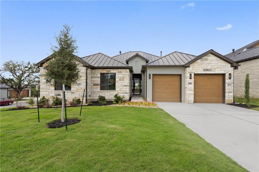 View 4232 Tamerind DR in Falconhead, Clubhouse Village 4232 Tamerind DR - front exterior - Luxury home in Falconhead, Clubhouse Village, Austin, TX