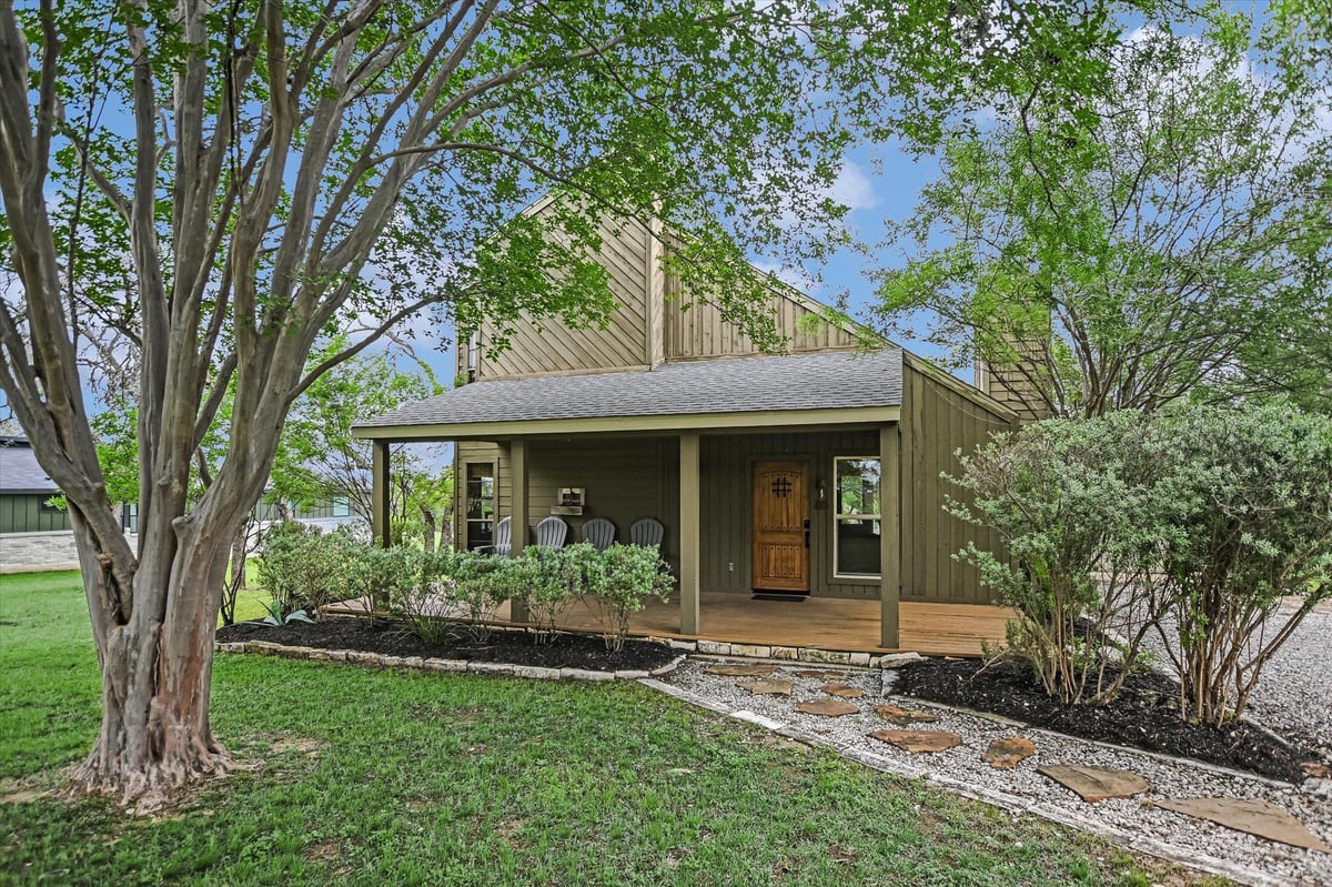 View 424 Bedford Dr in Windermere Oaks 424 Bedford Dr - front exterior - Luxury home in Windermere Oaks, Spicewood, TX