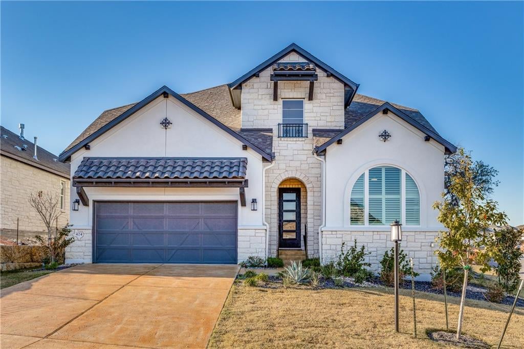 View 424 Sitlington Ln in Lakeway Hlnds Ph 3 Sec 3 424 Sitlington Ln - front exterior - Luxury home in Lakeway Hlnds Ph 3 Sec 3, Austin, TX
