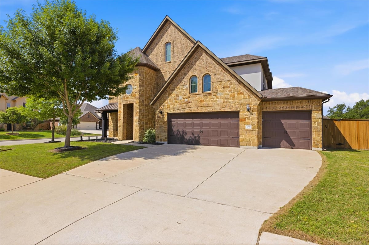 View 4301 Big Tree Trl in Trails of Shady Oak 4301 Big Tree Trl - front exterior - Luxury home in Trails of Shady Oak, Leander, TX