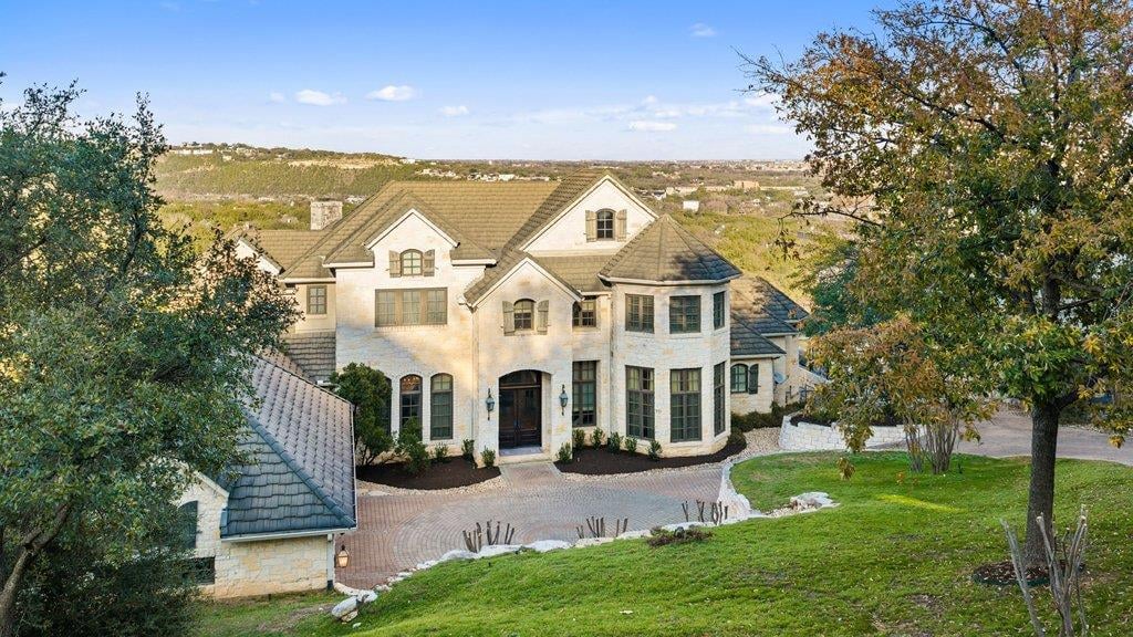 View 4320 River Garden TRL in Summit At West Rim On Mount Larson 4320 River Garden TRL - front exterior - Luxury home in Summit At West Rim On Mount Larson, Austin, TX