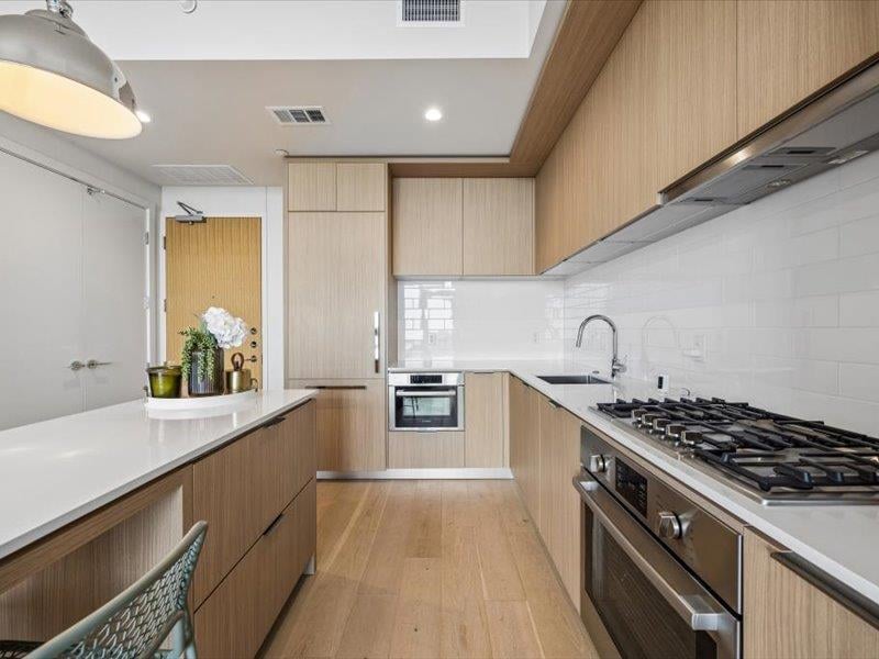 Primary bedroom at 44 East Ave Unit #1808 - 2 bed 2 bath home