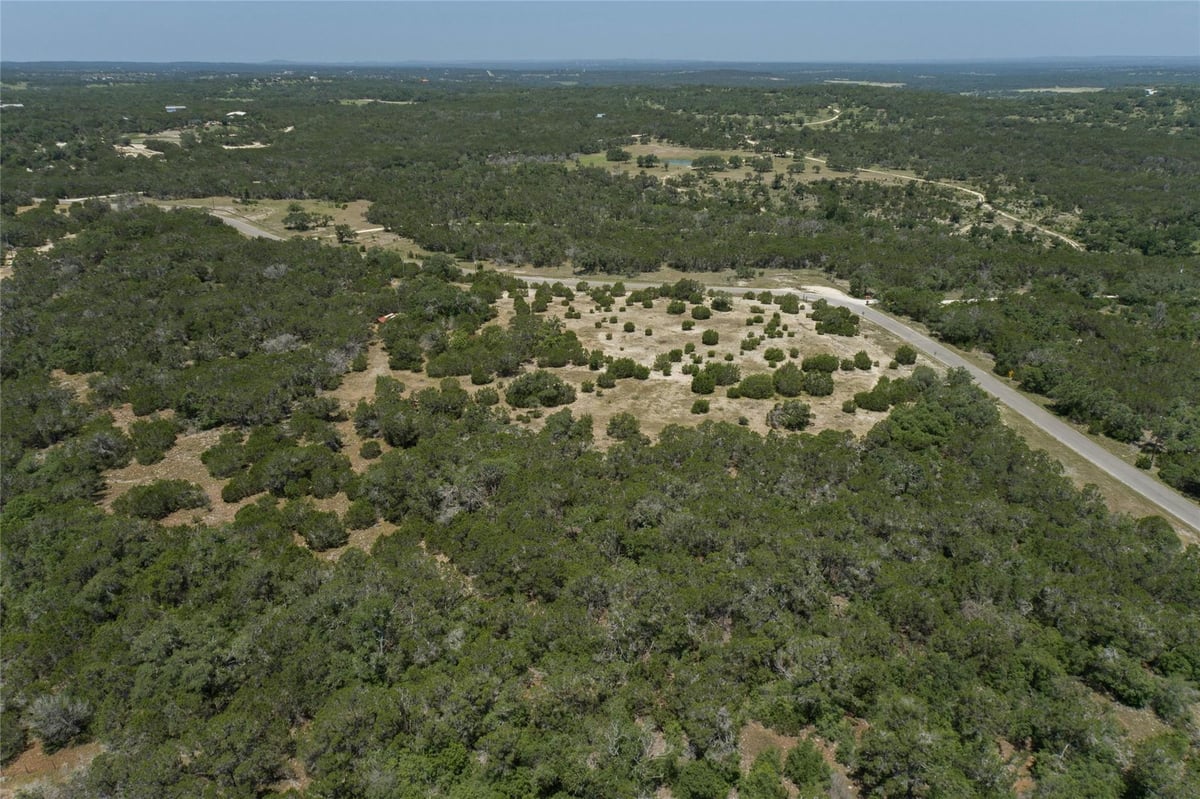 Primary bedroom at 4401 Cottonwood Rd - Burnett Ranch Sec 5, Wimberley, TX