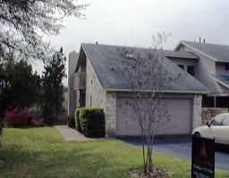 View 4404 TRAVIS COUNTRY CRES Unit #E1 in WOODS OF TRAVIS COUNTRY COND 4404 TRAVIS COUNTRY CRES Unit #E1 - front exterior - Luxury home in WOODS OF TRAVIS COUNTRY COND, Austin, TX