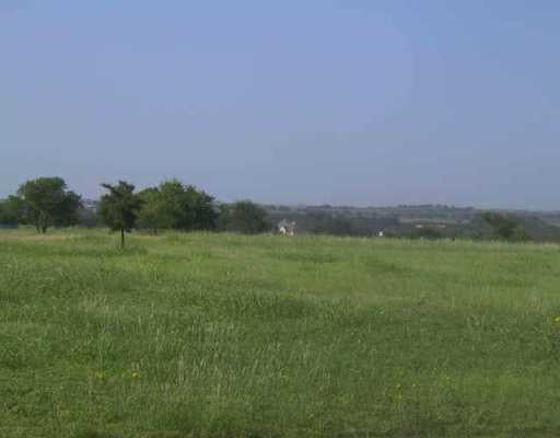 View 441 Heritage Loop 441 Heritage Loop - property photo 1 - Luxury lot in Hutto, TX