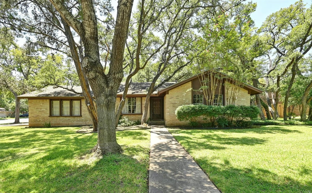 View 4410 Knob Oak LN in Trailwood Village One At Travi 4410 Knob Oak LN - front exterior - Luxury home in Trailwood Village One At Travi, Austin, TX