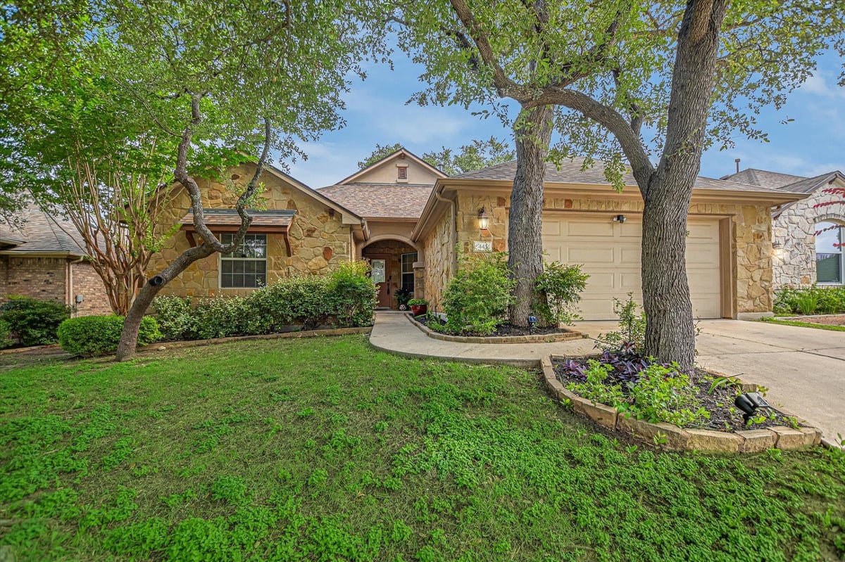 View 445 Manchester Ln in Belterra Ph II Sec 2 445 Manchester Ln - front exterior - Luxury home in Belterra Ph II Sec 2, Austin, TX