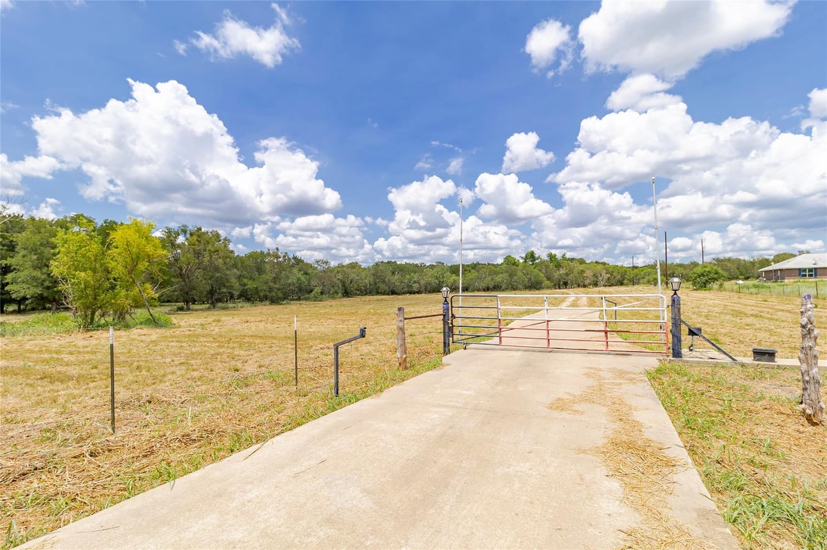 View 4459 Pettytown Rd 4459 Pettytown Rd - front exterior - Luxury home in Dale, TX