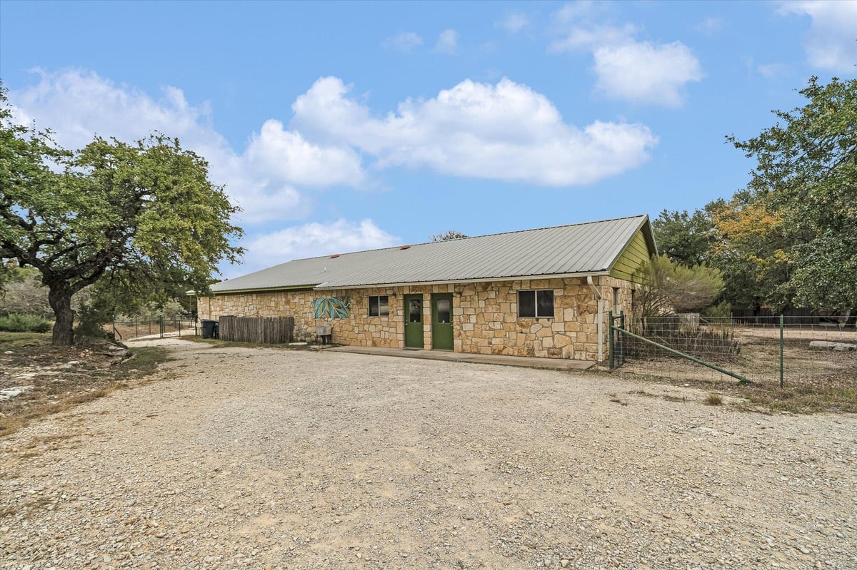 View 45 La Buena Vista Dr in Twenty Three Twenty Five Business Park Lot 1 Blk 1 45 La Buena Vista Dr - front exterior - Luxury home in Twenty Three Twenty Five Business Park Lot 1 Blk 1, Wimberley, TX