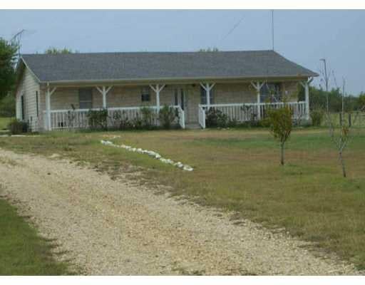 View 450 County Road 427 450 County Road 427 - front exterior - Luxury home in Thrall, TX