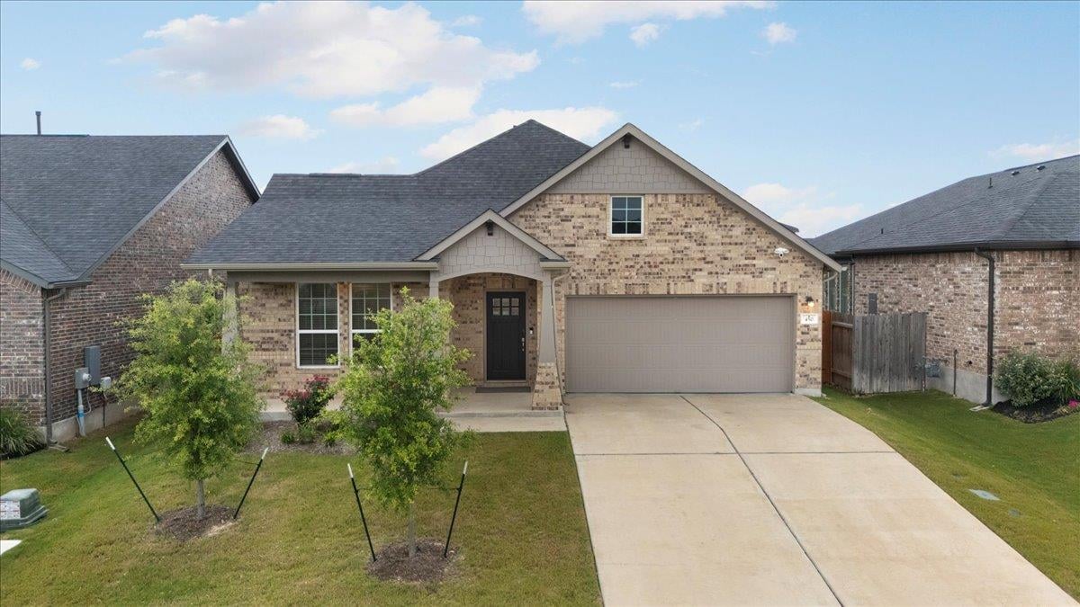 View 450 Durian LOOP in Sunfield Ph 5 Sec 3 450 Durian LOOP - property photo 1 - Luxury home in Sunfield Ph 5 Sec 3, Buda, TX