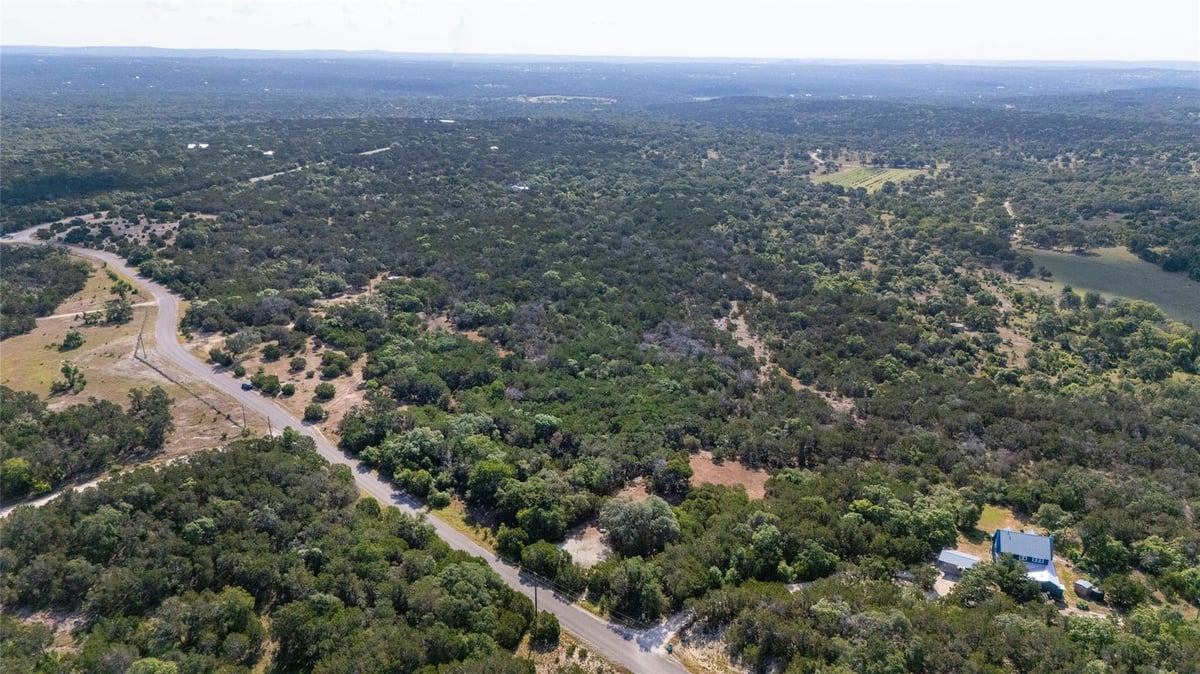 View 4501 Cottonwood Rd in Burnett Ranch Sec 5 4501 Cottonwood Rd - front exterior - Luxury lot in Burnett Ranch Sec 5, Wimberley, TX