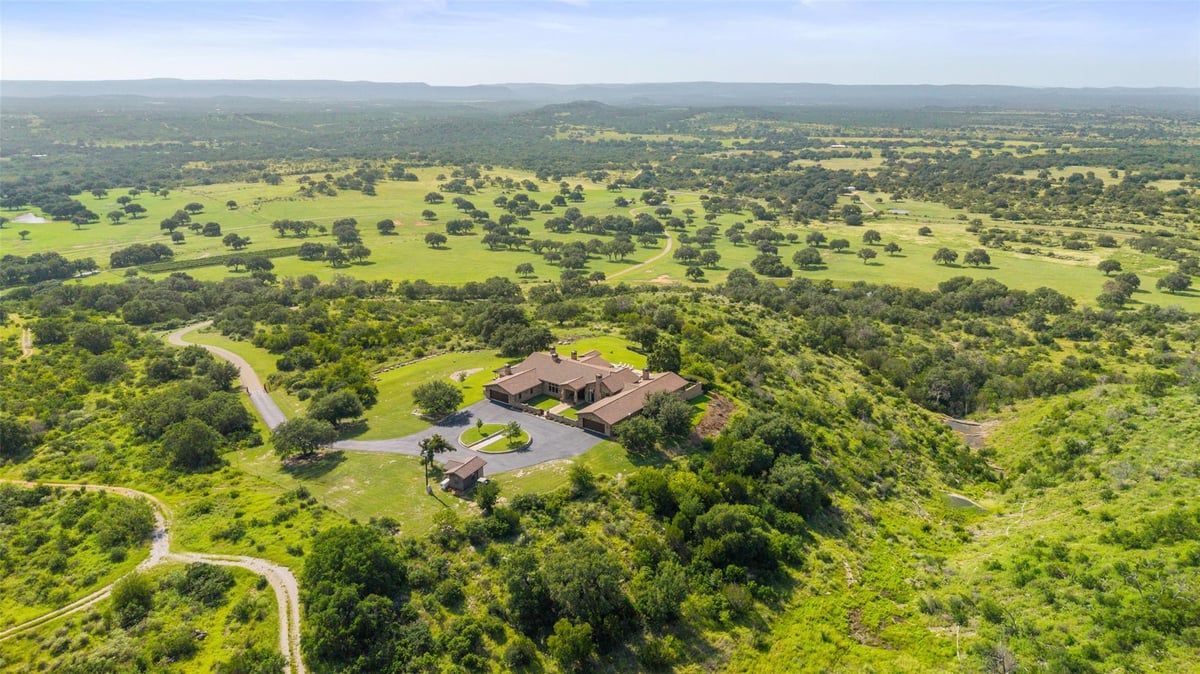 Aerial view with aerial drone photography at 4529 Ranch Road 3347 - 5 bed 4 bath home