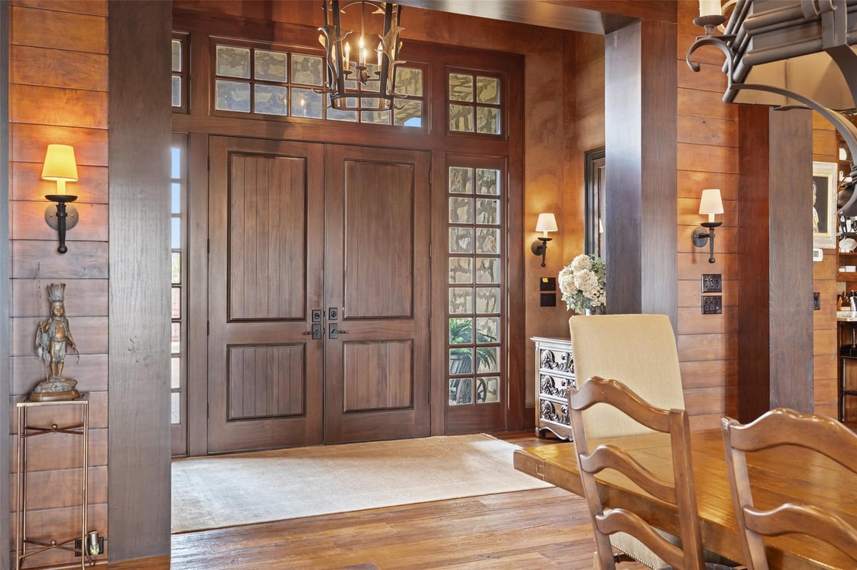 Foyer with Custom solid wood double doors with tran at 4529 Ranch Road 3347 - 5 bed 4 bath home
