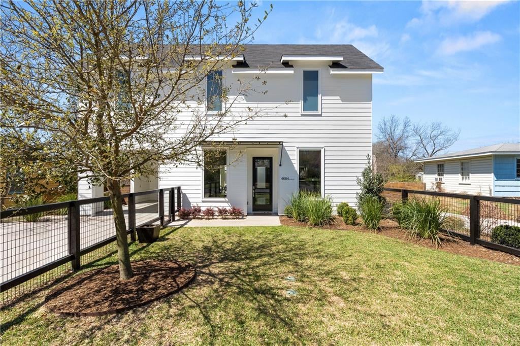 View 4604 BANISTER Ln Unit #A in Forest Oaks 4604 BANISTER Ln Unit #A - front exterior - Luxury home in Forest Oaks, Austin, TX