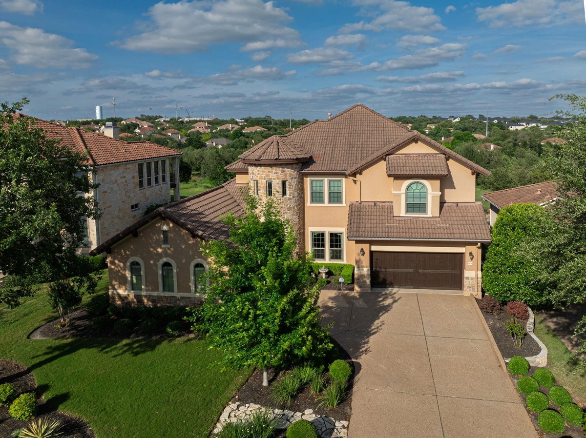 View 4609 Bat Falcon Dr in Spillman Ranch Ph 03 4609 Bat Falcon Dr - front exterior - Luxury home in Spillman Ranch Ph 03, Austin, TX