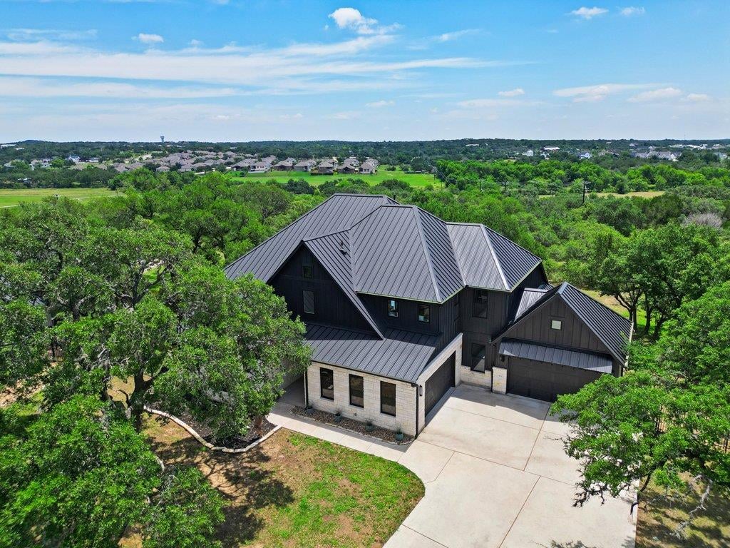View 461 Crosswater LN in Caliterra Ph Two Sec Eight 461 Crosswater LN - front exterior - Luxury home in Caliterra Ph Two Sec Eight, Dripping Springs, TX