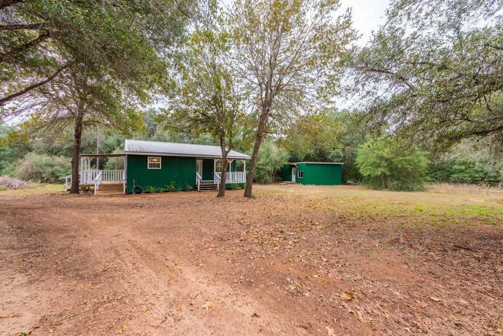 View 4623 County Road 444 in Bee Creek Sub 4623 County Road 444 - front exterior - Luxury home in Bee Creek Sub, Waelder, TX