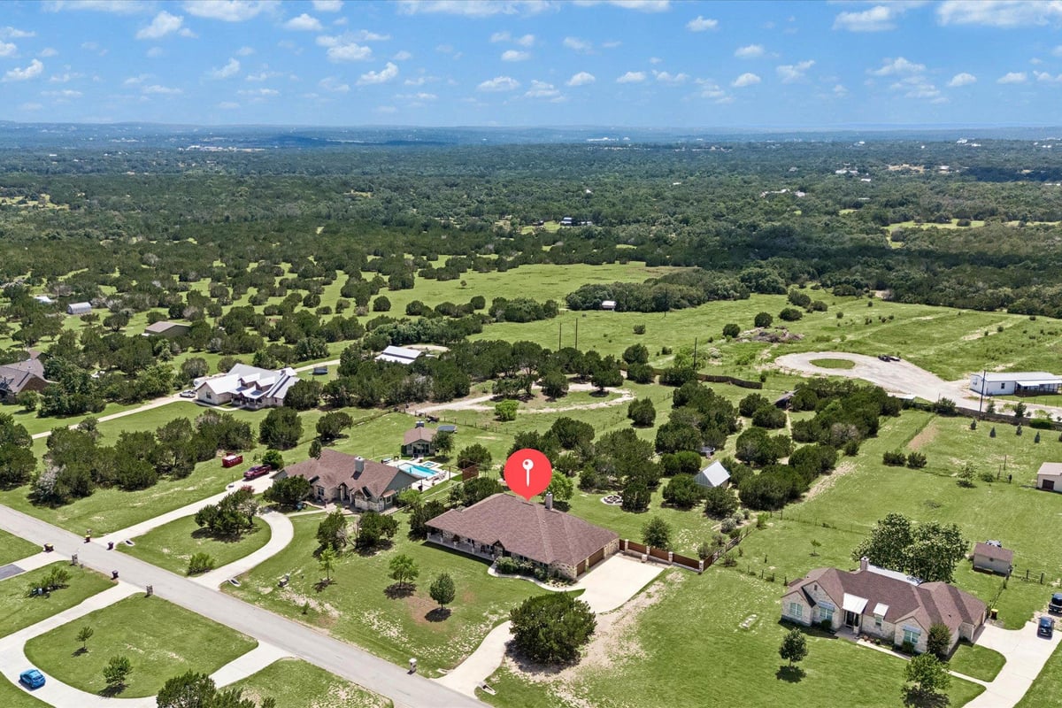 View 466 Chama TRCE in Chama Trace 466 Chama TRCE - front exterior - Luxury home in Chama Trace, Dripping Springs, TX