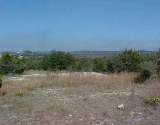 View 473 Hill Country Trl 473 Hill Country Trl - front exterior - Luxury lot in Wimberley, TX