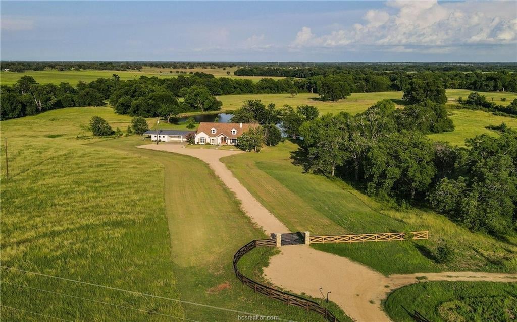 View 4791 State Highway 21 W (+/- 25 acres) in None 4791 State Highway 21 W (+/- 25 acres) - front exterior - Luxury home in None, Caldwell, TX