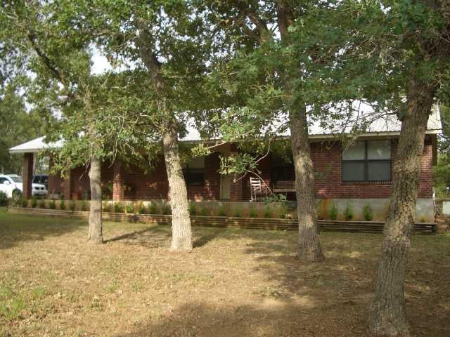 View 480 Copeland Hill RD 480 Copeland Hill RD - front exterior - Luxury home in Smithville, TX