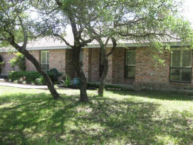 View 480 Oak Forest DR 480 Oak Forest DR - front exterior - Luxury home in Dripping Springs, TX