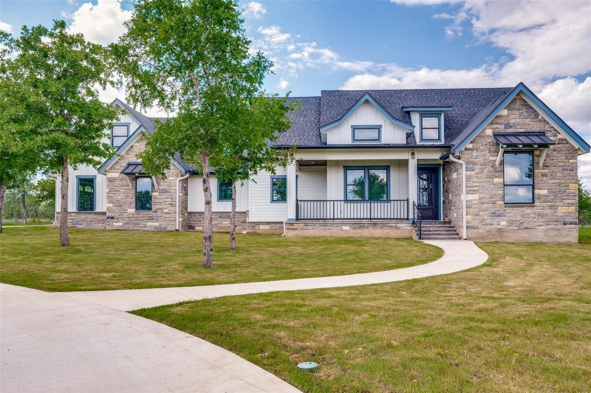 View 485 Post Oak in Whispering Oaks 485 Post Oak - front exterior - Luxury home in Whispering Oaks, Gonzales, TX
