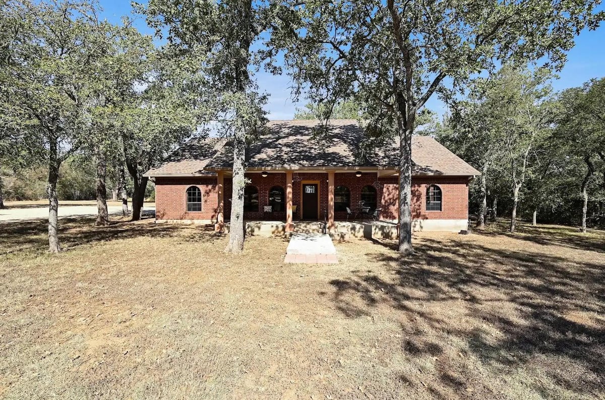 View 486 Westwood Rd in BERRY, ESTHER, ACRES 4.558 486 Westwood Rd - front exterior - Luxury home in BERRY, ESTHER, ACRES 4.558, Lockhart, TX