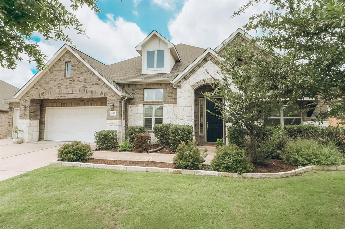 View 487 Stone River Dr in Highpointe Ph V Sec Three 487 Stone River Dr - front exterior - Luxury home in Highpointe Ph V Sec Three, Austin, TX