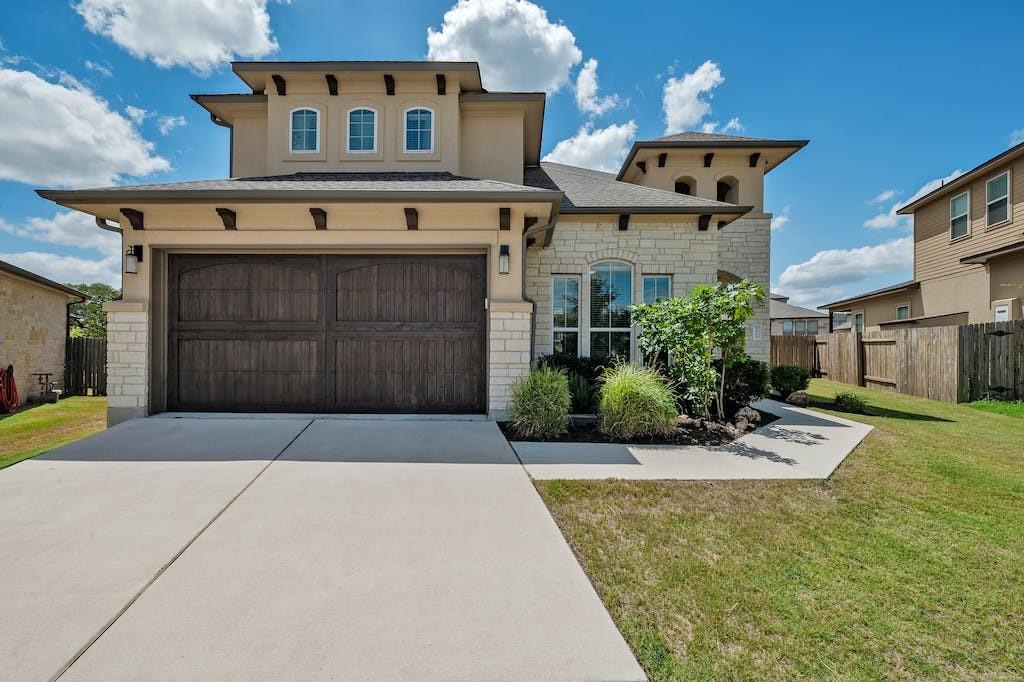 View 4909 Mandevilla Dr in Greyrock Ridge Ph 3 4909 Mandevilla Dr - front exterior - Luxury home in Greyrock Ridge Ph 3, Austin, TX