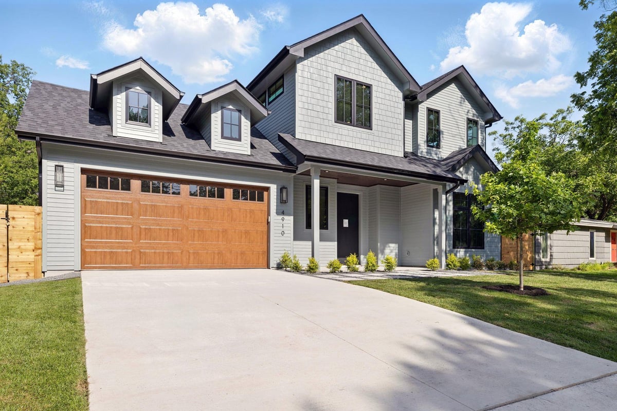 View 4910 W Park Dr in Highland Village Sec 01 4910 W Park Dr - front exterior with newer construction facade - Luxury home in Highland Village Sec 01, Austin, TX