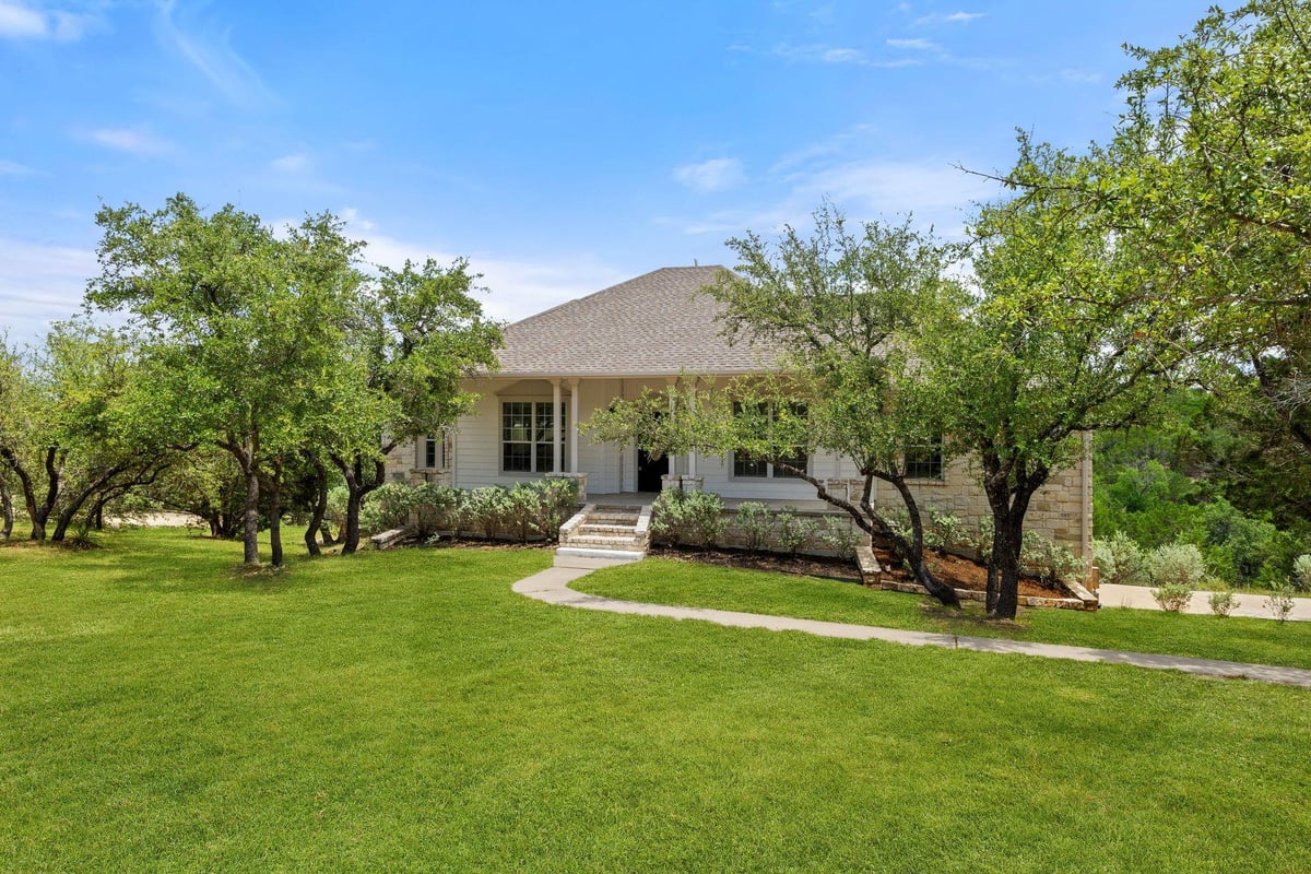 View 4921 Creek Meadow Cv in Travis Settlement Sec 03 4921 Creek Meadow Cv - front exterior - Luxury home in Travis Settlement Sec 03, Spicewood, TX
