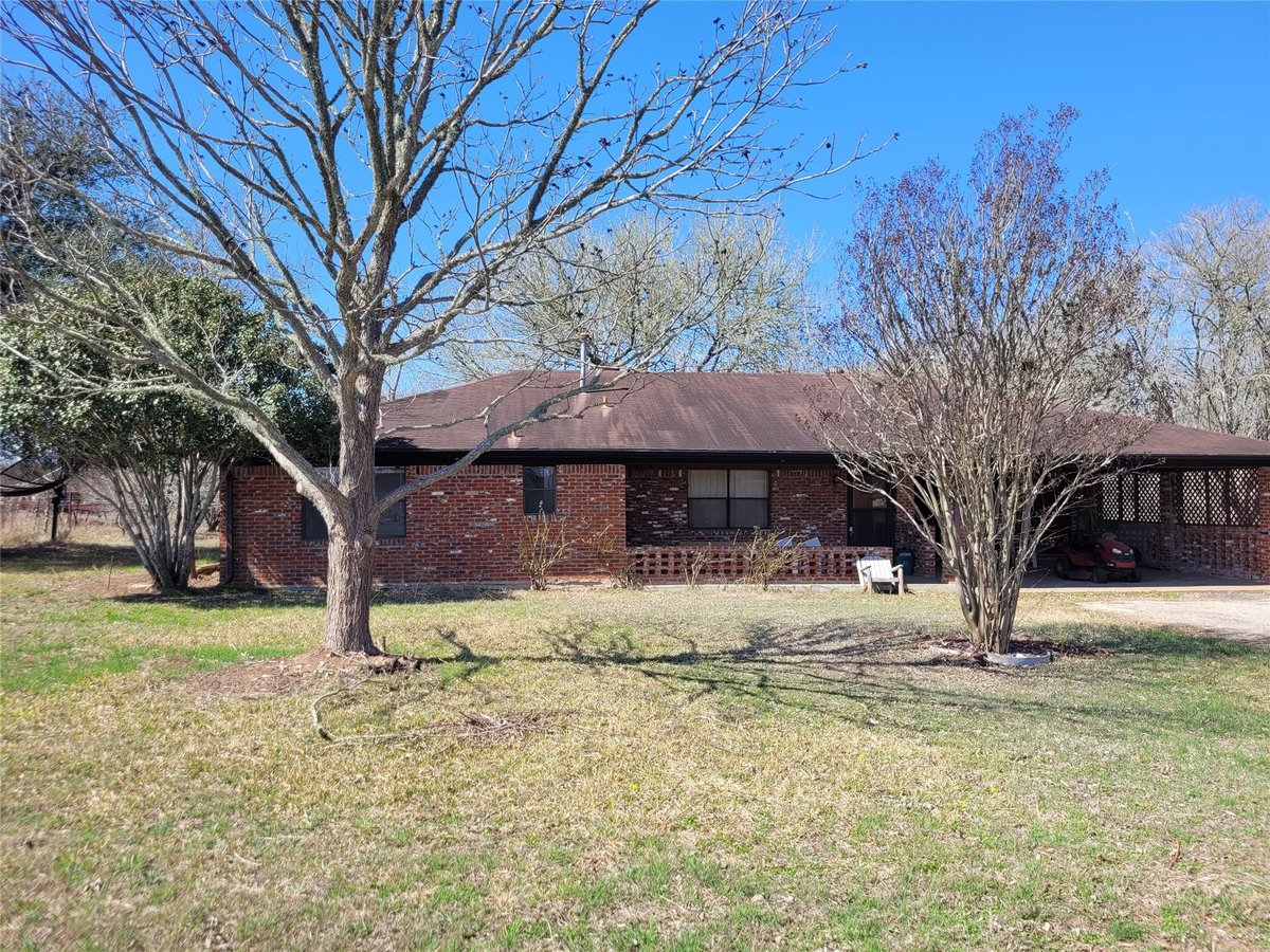 View 497 Fm 153 in Morris, Jonathan D 497 Fm 153 - front exterior - Luxury home in Morris, Jonathan D, Smithville, TX