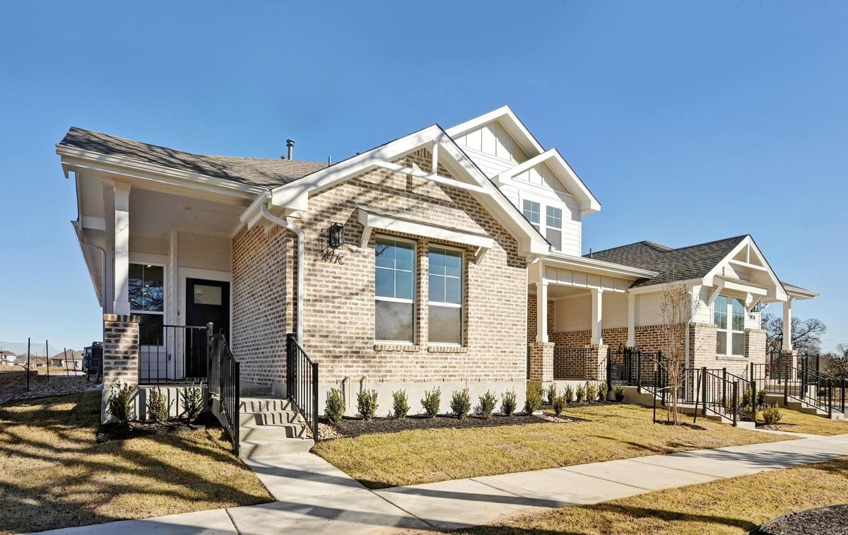 497 Orleanian DR Unit #C - property photo 1 - Luxury home in The Porch at Du Pre, Buda, TX