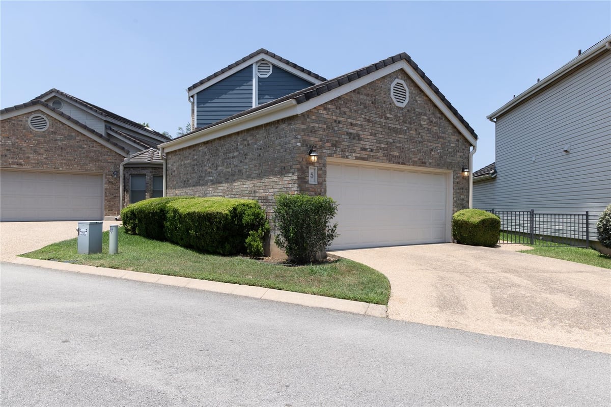 View 5 Champions Ln in Champions Lakeway 5 Champions Ln - front exterior - Luxury home in Champions Lakeway, Lakeway, TX