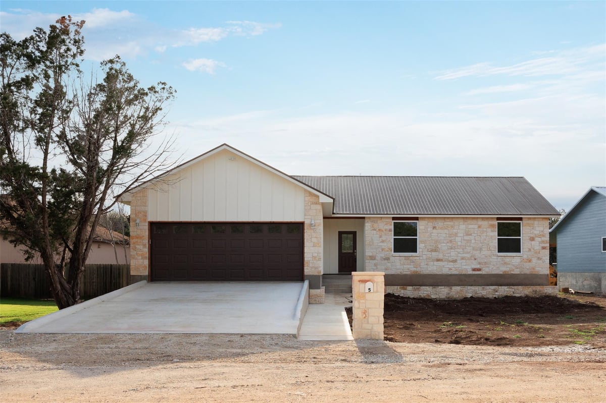 View 5 Quiet Meadow Cir in Woodcreek Sec 9-A 5 Quiet Meadow Cir - front exterior - Luxury home in Woodcreek Sec 9-A, Wimberley, TX