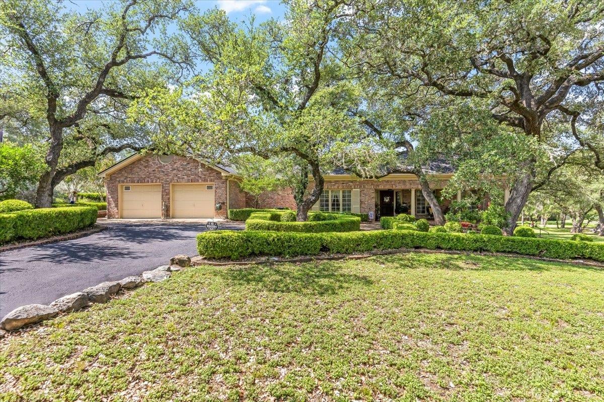 View 50 Brookmeadow DR in Brookmeadow Sec 2 50 Brookmeadow DR - front exterior - Luxury home in Brookmeadow Sec 2, Wimberley, TX