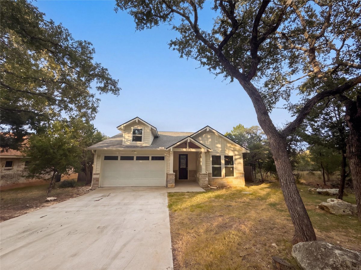 View 50 Whispering Valley DR in WOODCREEK SEC 9-B 50 Whispering Valley DR - property photo 1 - Luxury home in WOODCREEK SEC 9-B, Wimberley, TX
