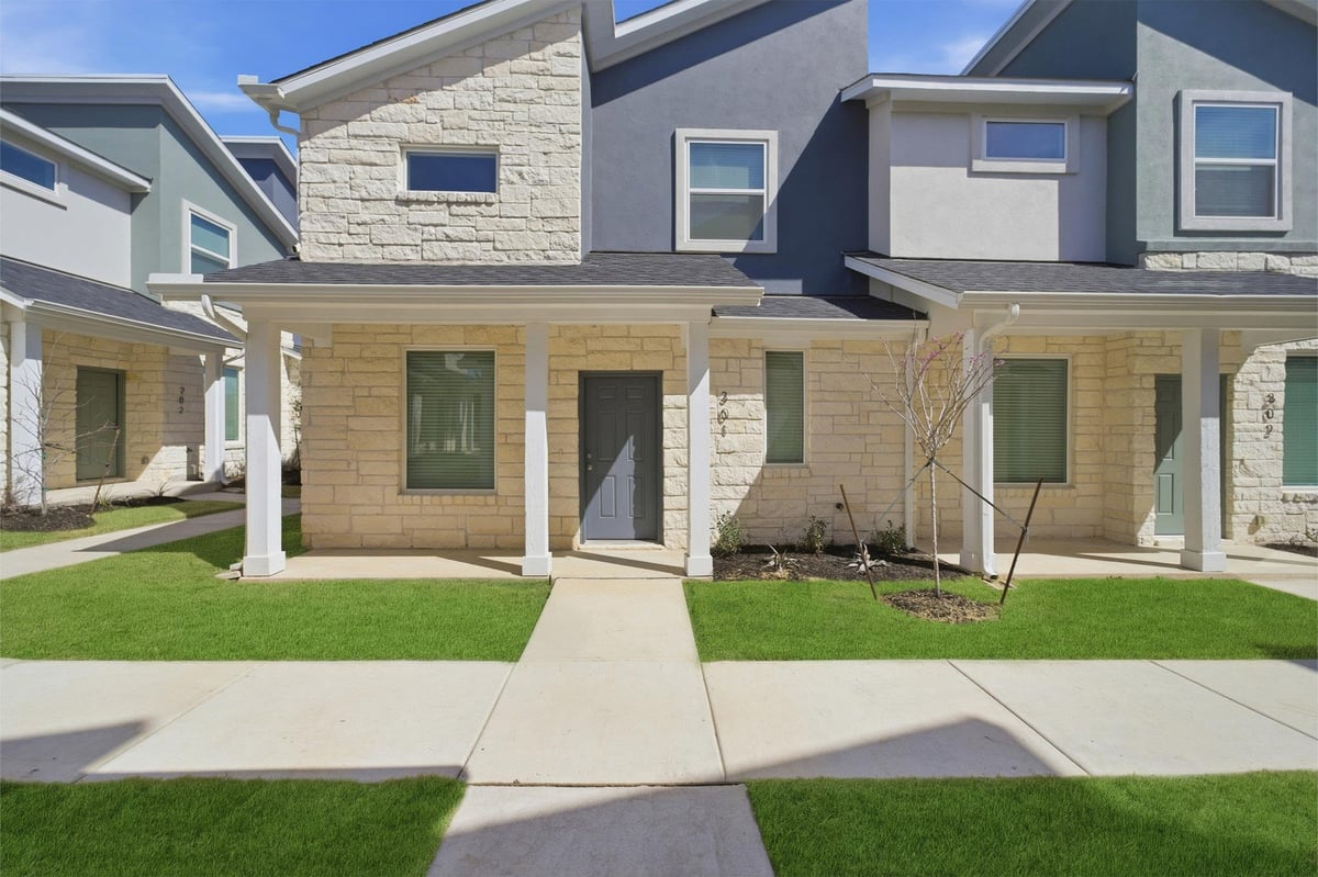 View 500 Municipal Dr Unit #301 in Municipal Drive Townhomes 500 Municipal Dr Unit #301 - front exterior - Luxury home in Municipal Drive Townhomes, Leander, TX