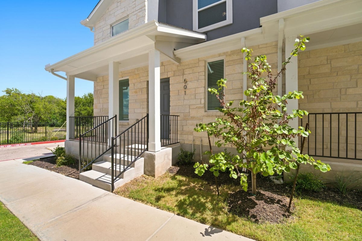 View 500 Municipal DR Unit #501 in Municipal Drive Townhomes 500 Municipal DR Unit #501 - property photo 1 - Luxury home in Municipal Drive Townhomes, Leander, TX