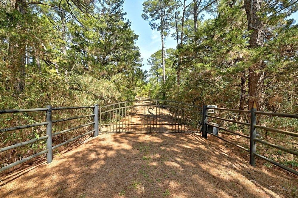 View 500 Pine Valley Loop in Pine Valley Estates 500 Pine Valley Loop - property photo 1 - Luxury lot in Pine Valley Estates, Smithville, TX