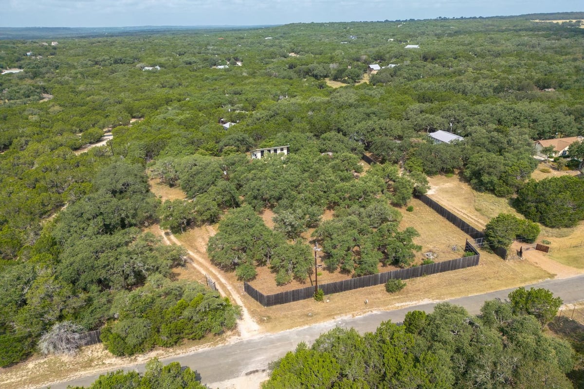View 500 Ridge Oak DR in River Oaks Of Wimberley Unit 1 500 Ridge Oak DR - property photo 1 - Luxury home in River Oaks Of Wimberley Unit 1, Wimberley, TX