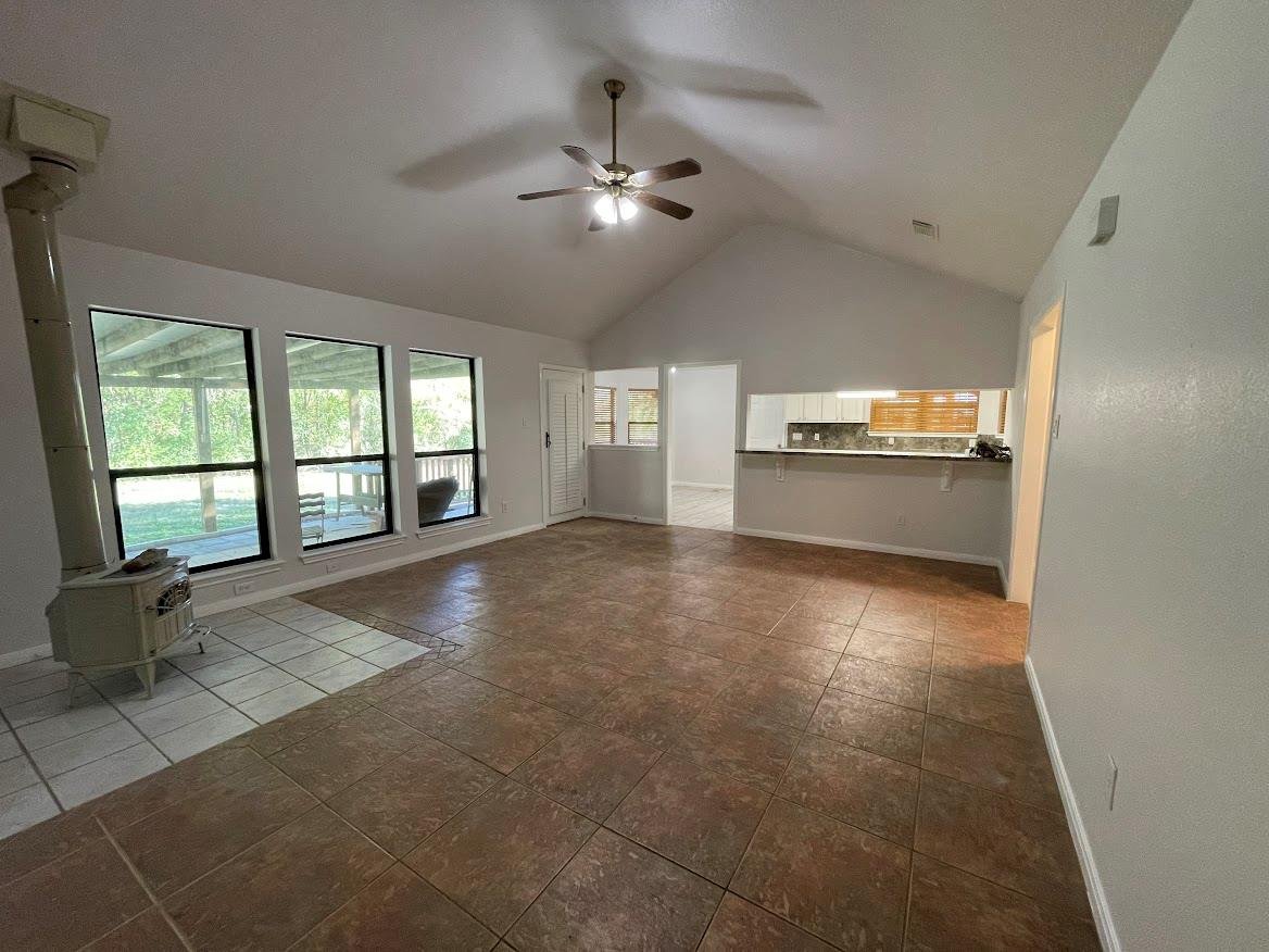 Primary bedroom at 5001 Blue Bluff Rd - 3 bed 2 bath home