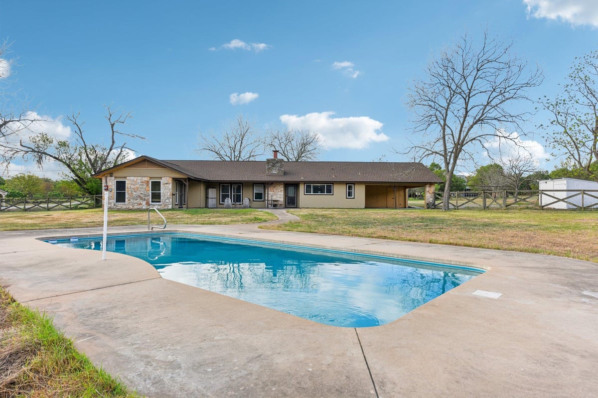 View 504 Buckaroo Trl in Oxbow Trails Sec 1 504 Buckaroo Trl - front exterior - Luxury home in Oxbow Trails Sec 1, Buda, TX